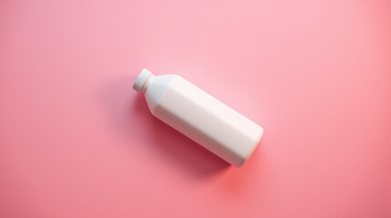 White Plastic Bottle on Pink Background Simple Clean Minimalist Design