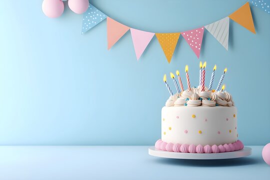 Birthday cake with candles and colorful bunting on blue background. Festive party decoration. Kids celebration, baby shower concept with copy space