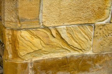 Detail of sandstone weathering on outer wall of church, Tasmania, Australia
