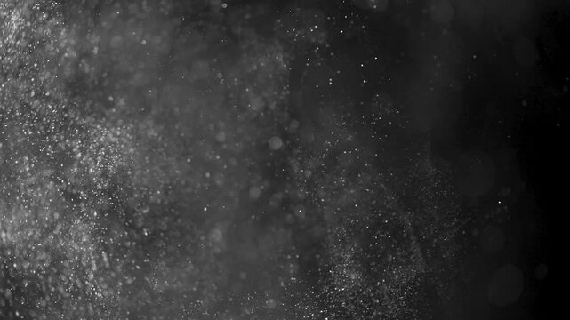 Floating dust motes particles in slow motion. High quality 4k footage