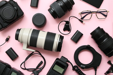 Composition with modern photo equipment on pink background