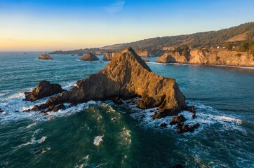 Coastal landscape of Northern California, USA, featuring rugged cliffs and sea stacks along the...