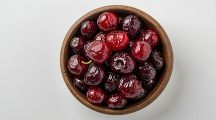 Cherries in a Wooden Bowl on White Background.....