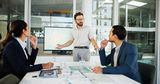Businessman, screen or presentation with map for renewable energy or eco development at office. Man, employee or speaker with technology display for wind turbine or global implementation at workplace