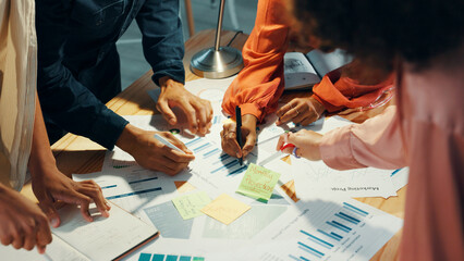 Hands, graphs and group of business people planning strategy, performance analysis and writing on...