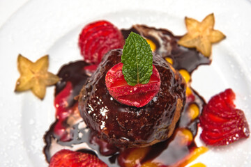 Fried ice cream, fried ice cream dessert with strawberries and covered in chocolate on a white background