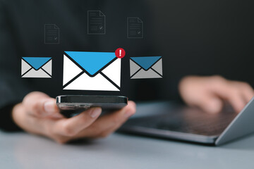 Businesswomen checking email via smartphone have spam malware screen alerts, cyber internet web...