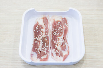 Raw of slice ​​duck meat in a tray for Shabu Shabu, Japanese hot pot