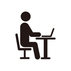 机で仕事をしている人のピクトグラムアイコン
