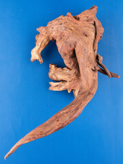 Detailed view of rustic driftwood, perfect for aquariums or terrariums no  purple background.