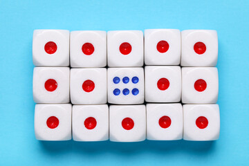 Dices with red and blue pips on blue background