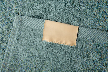 blank towel tag in beige color
