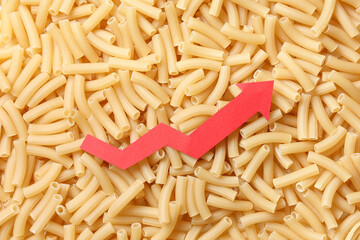 Heap of pasta with arrow. Concept of rising price
