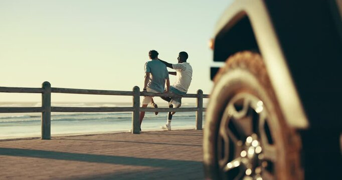 Friends, travel and men talking by beach for bonding, conversation and communication. Road trip, nature and people with car for hangout, chill and chatting on holiday, vacation and weekend outdoor