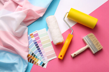 Color palettes with painting tools and transgender flag on color background