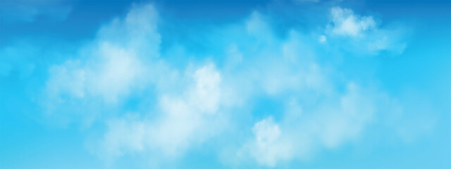 Clear blue sky with a few light, fluffy white clouds. It looks like a typical clear day with a clean atmosphere