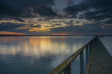 Naklejka premium sunset over the lake
