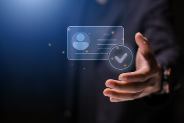 human hand holding digital identification card, with Checkmark Icons for Identity verification, ID card with checkmark. Personality approve. Employee badge.