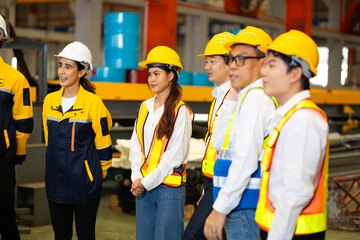 Morning Brief meeting. Professional supervisor engineers assignmenting discussion together before start working In morning meeting. metal sheet profiling factory. Industrial production