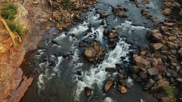 The rapids in front of the village of Tad Lo in Asia, Laos, in Champassak, on the Bolaven Plateau, on a sunny day.&nbsp;