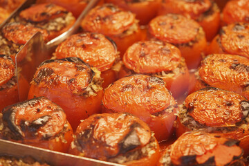 Delicious stuffed tomatoes displayed at a local market