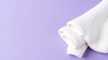 Obraz premium Soft Hand Towels on Purple Background