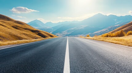 Fototapeta premium Asphalt Road Through Majestic Mountains