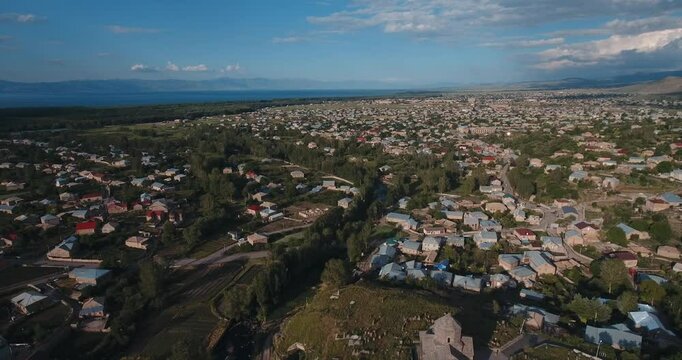 Aerial view of the Nerkin Getashen village in Martuni city in Gegharkunik, Armenia on a sunny day