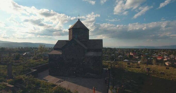 Drone shot of Kotavank church in Nerkin Getashen village, in Gegharkunik Province, Armenia at sunset