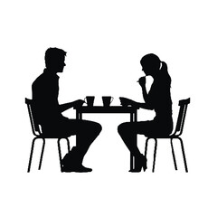 silhouette of a couple in a restaurant