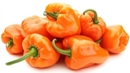 pile of vibrant orange habanero peppers a spicy culinary ingredient enhancing flavor and heat isolated on a clean white surface backdrop
