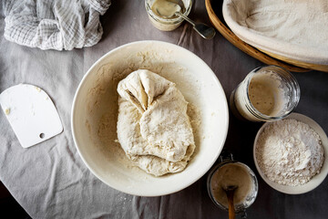 Making sourdough bread, raw dough in a bowl