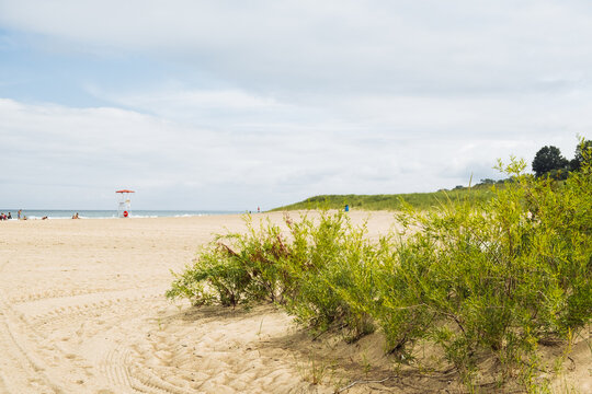Beach landscape with lifeguard station on a cloudy day