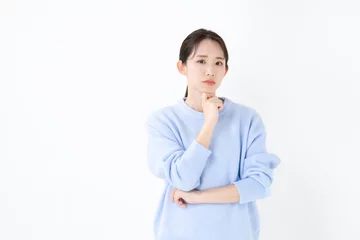 Fotobehang 悩む女性 © naka