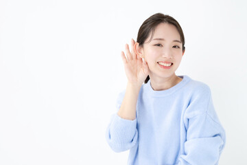 聞く女性
