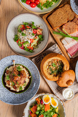 A vibrant spread of dishes highlights diverse flavors, textures, and ingredients