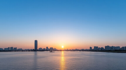 serene city skyline at sunset, reflecting warm hues on water surface