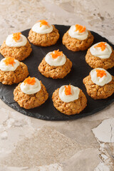 Cream Cheese Carrot Cake Cookies close up on the plate on the table. Vertical