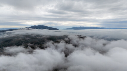 Peaks of the Carrascoy and Espuña mountain ranges above the clouds after the storm in the Region of Murcia, Spain.