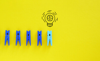 Creative thinking idea and problem solving innovation concept. Miniature figure outstanding from...