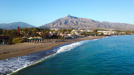 aerial view from the Mediterranean Sea to the beach, the Río Verde and the Puente de Puerto Banús...