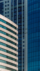 Obraz premium many windows and walls facade of a modern skyscraper without people