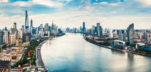 Aerial panorama of Shanghai city skyline with Huangpu River and financial district modern...