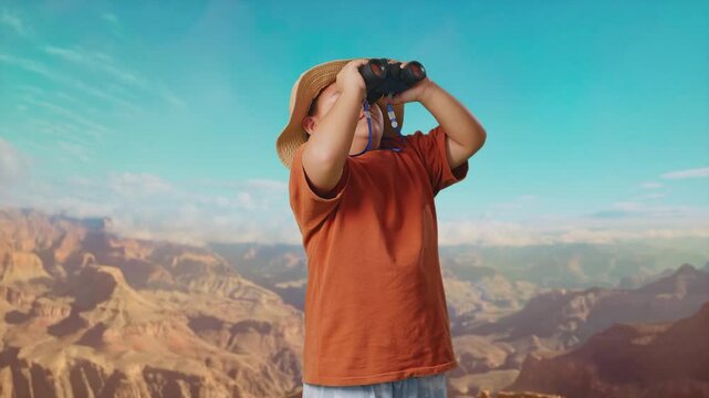 Asian Boy With A Hat Standing Doubtfully And Asking Why After Looking Through The Binoculars. Boy Researcher Examines Something While Traveling At The Top Of Mountain, Travel Tourism Adventure Concept