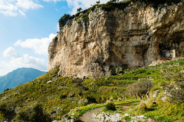 Panoramic view from hiking trail Path of Gods between coastal towns Positano and Praiano. Trekking in Lattari Mountains, Apennines, Amalfi Coast, Campania, Italy, Europe. Coastline Mediterranean Sea.