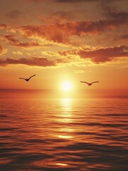 Fototapeta premium Golden Sunset Seascape: Two Birds in Flight