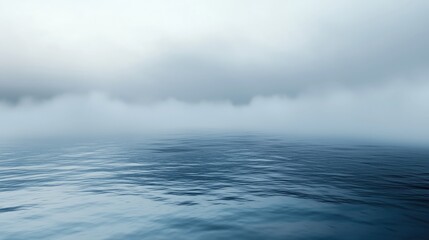 Obraz premium Serene ocean with misty horizon and tranquil atmosphere