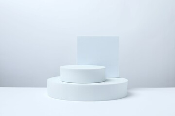 White podiums on a light background