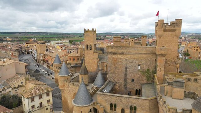 Aerial view of the medieval royal palace of olite with its impressive towers and walls, dominating the old town of olite in navarre, spain