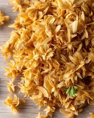 Freshly grated horseradish served on a rustic wooden board, highlighted by natural light